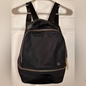 Black Backpack with Gold Accents
